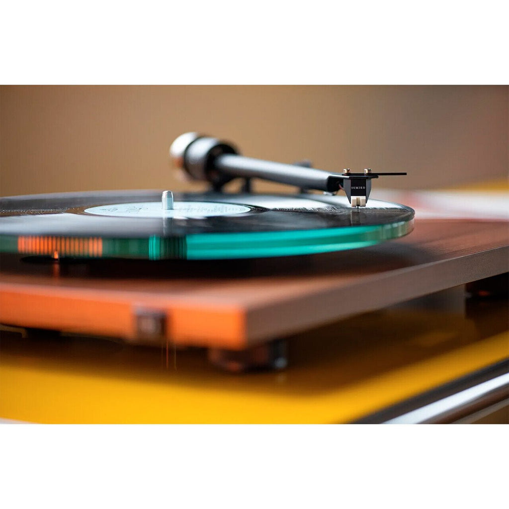 Pro-Ject T2 Super Phono turntable with walnut finish, featuring a sleek design and high-quality tonearm for optimal sound.