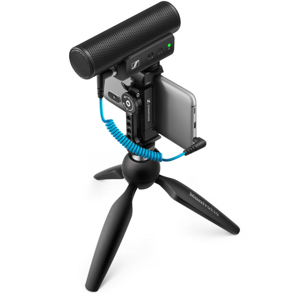 Sennheiser MKE 400 MK2 camera microphone with compact design, shown in a product shot on a desktop setup.