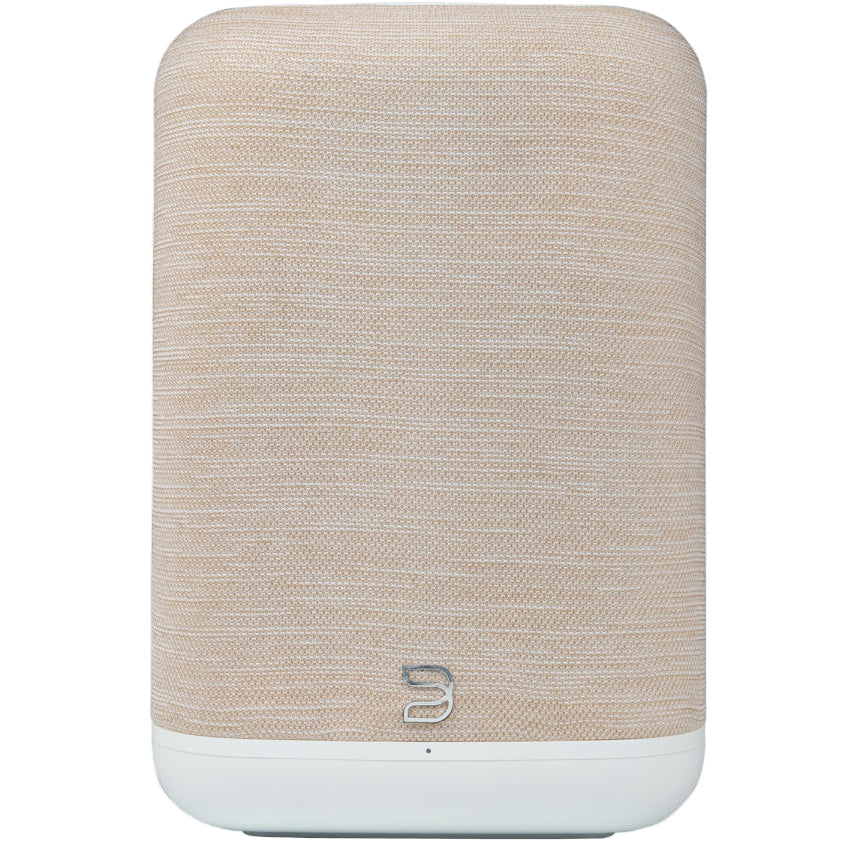 Bluesound Pulse Flex 2025 wireless speaker in tan color, front view showing sleek design and compact size.