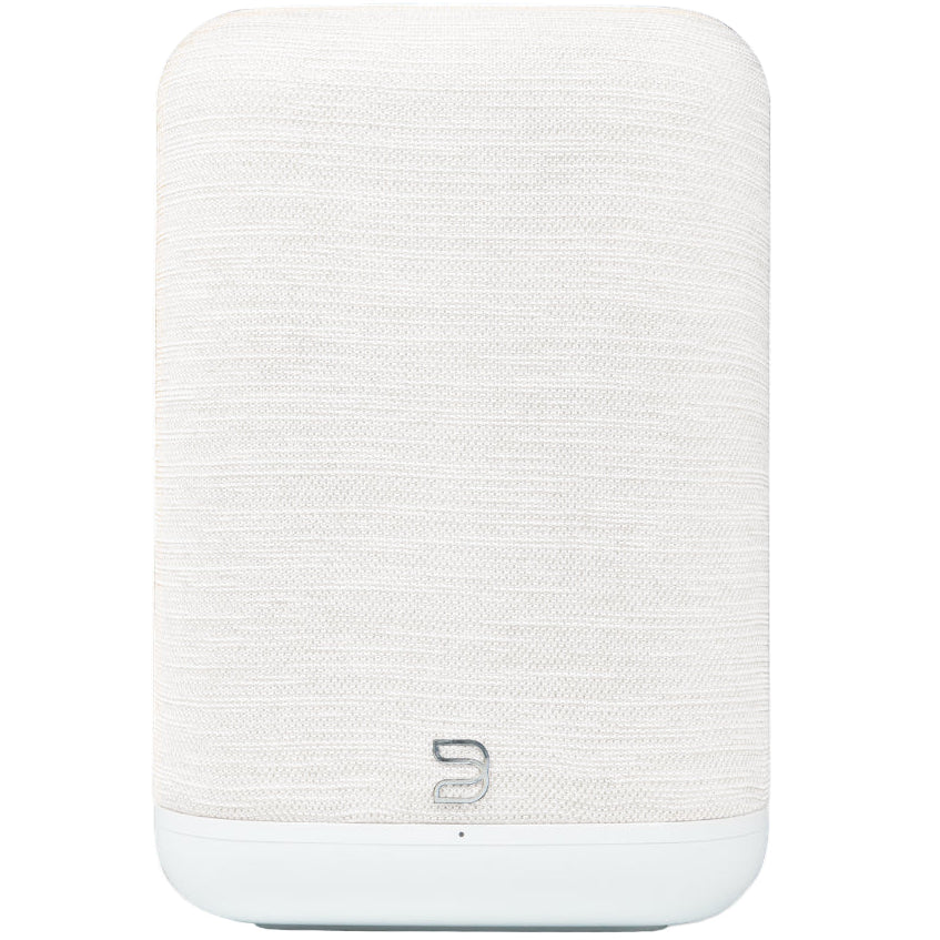White Bluesound Pulse Flex 2025 wireless speaker with front grille and shadow detail, compact and modern design.