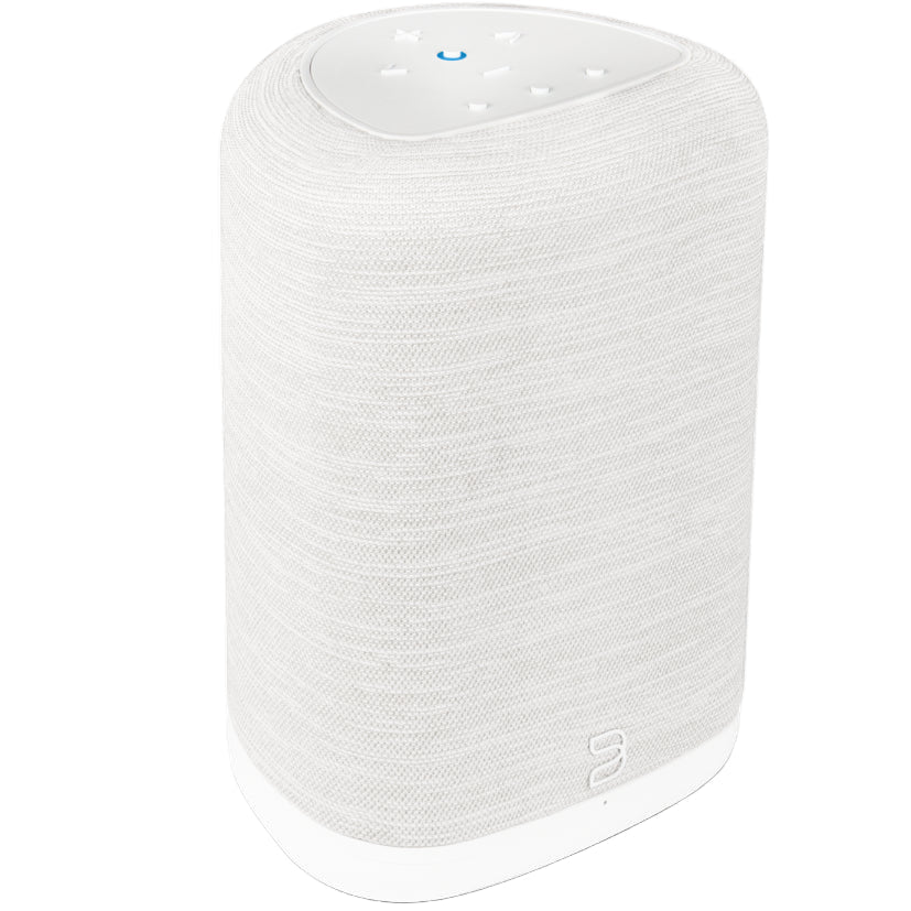 White Bluesound Pulse Flex 2025 wireless speaker shown from above with shadow, highlighting its compact, modern design.