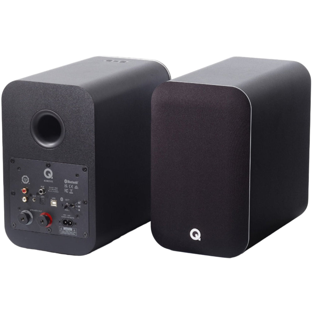 Q Acoustics M20 HD wireless speakers set with sleek black design and modern controls, showcasing their compact, stylish appearance.