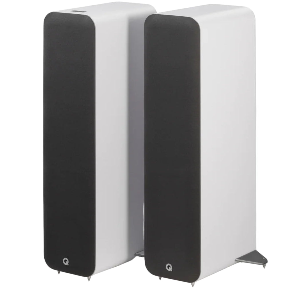 Pair of Q Acoustics M40 wireless speakers in white, angled front view showing sleek design and speaker grilles.