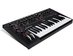 Moog Messenger synthesizer with knobs and controls, compact electronic music instrument by Moog.