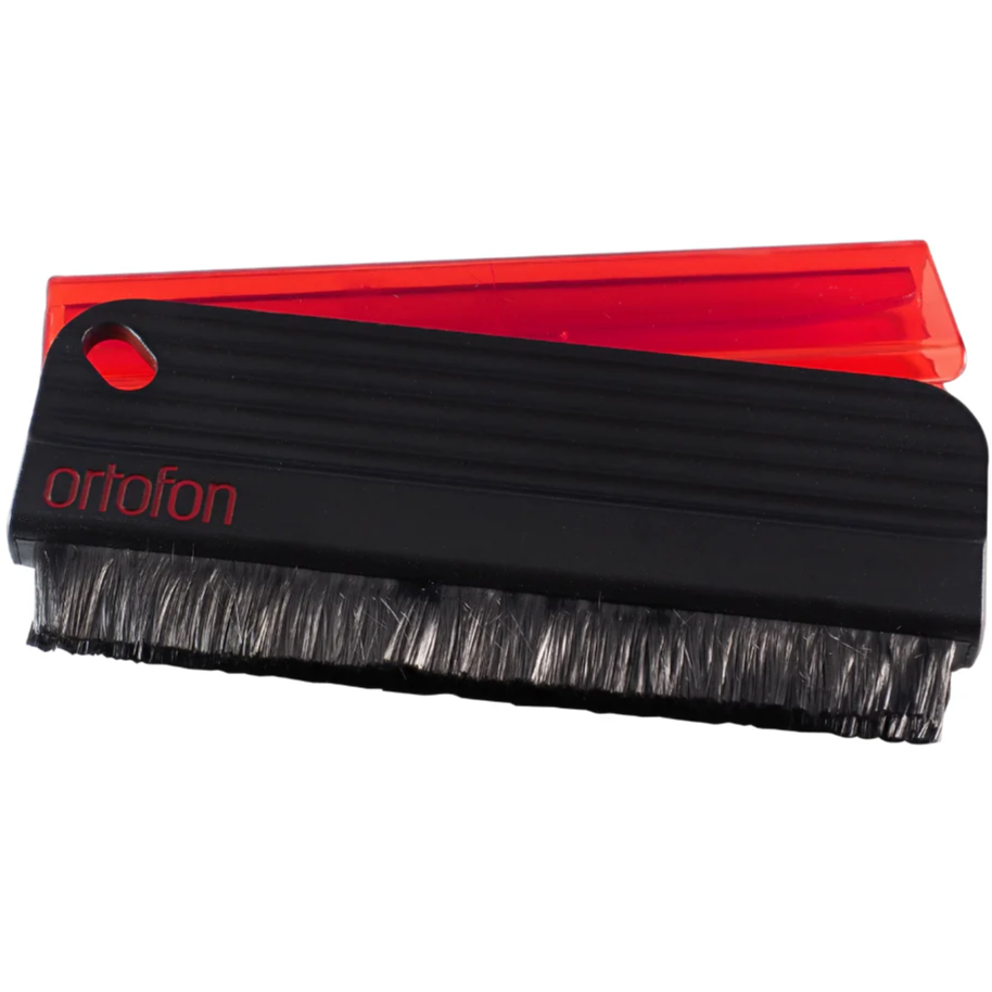 Ortofon record brush for cleaning vinyl records, featuring soft bristles to remove dust and static from record surfaces.