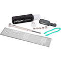 Reloop turntable cartridge mount and gauge set with precision tools for accurate cartridge alignment and setup.