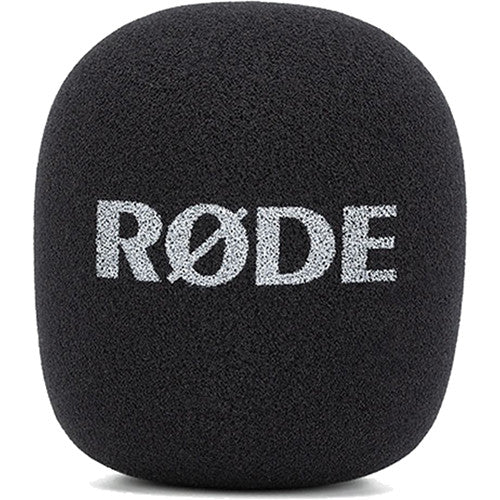 Rode Interview GO handheld microphone adapter for Rode Wireless GO creator wireless microphone systems, shown in use.