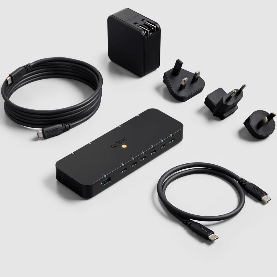 Rode Hub docking station with multiple USB ports and RGB lighting, compact black design for seamless device connectivity.