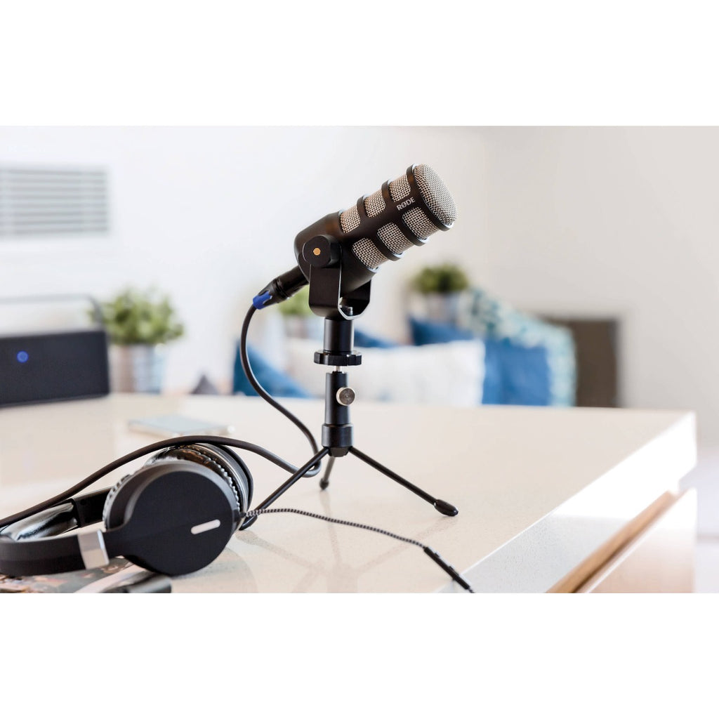 Rode PodMic dynamic microphone with black metal body and grille, designed for professional podcasting and broadcasting.