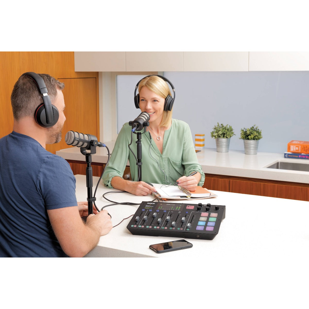 Rode PodMic dynamic microphone with rugged metal body and grille, ideal for podcasting and broadcasting.