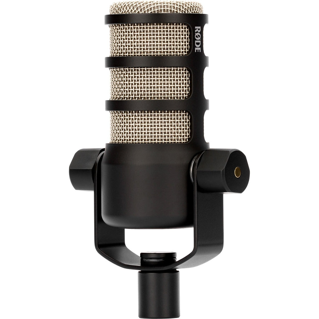 Rode PodMic dynamic microphone with black metal body and grille, mounted on a stand, designed for podcasting and broadcasting.