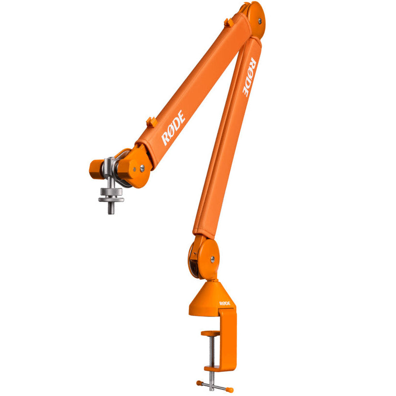 Rode PSA1+ broadcast microphone arm with orange finish, adjustable metal arm for professional studio audio setup.
