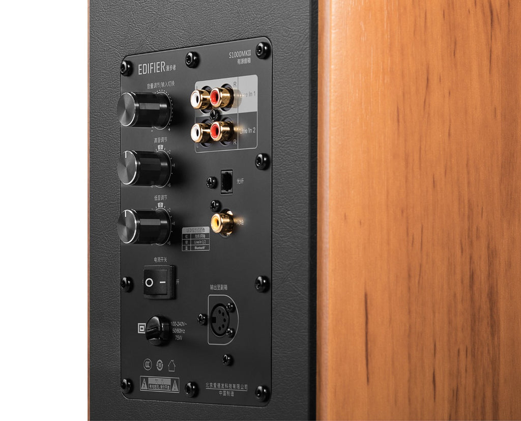 Edifier S1000MKII desktop speakers with black wood finish, featuring dual drivers and control knobs on the front panel.