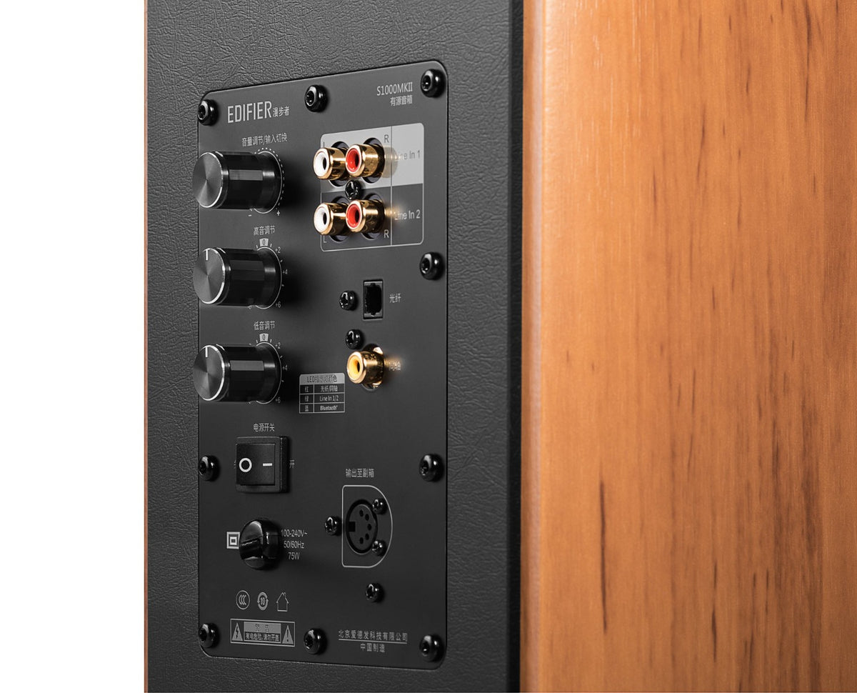 Edifier S1000MKII desktop speakers with black wood finish, featuring dual drivers and control knobs on the front panel.
