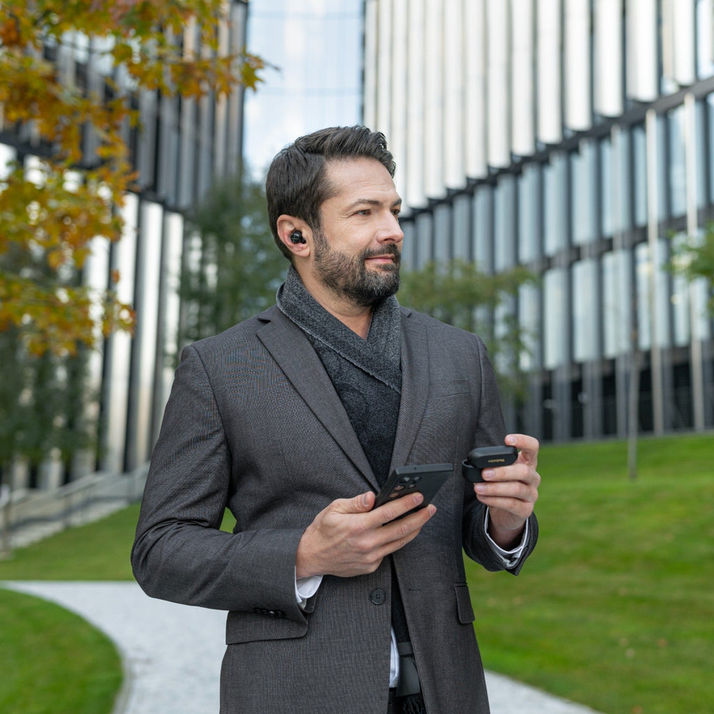 Wireless in-ear headphones by Technics, model EAH-AZ100, shown with sleek black design and compact earbud structure.