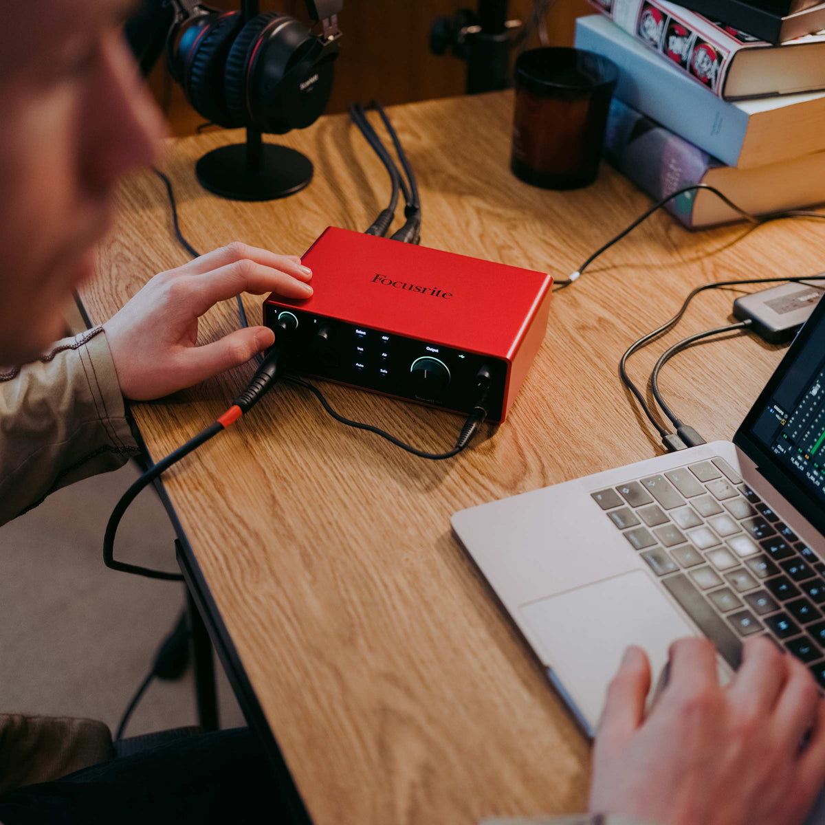 Focusrite Scarlett 4i4 4th Gen audio interface with multiple input and output ports, designed for professional audio recording and mixing.