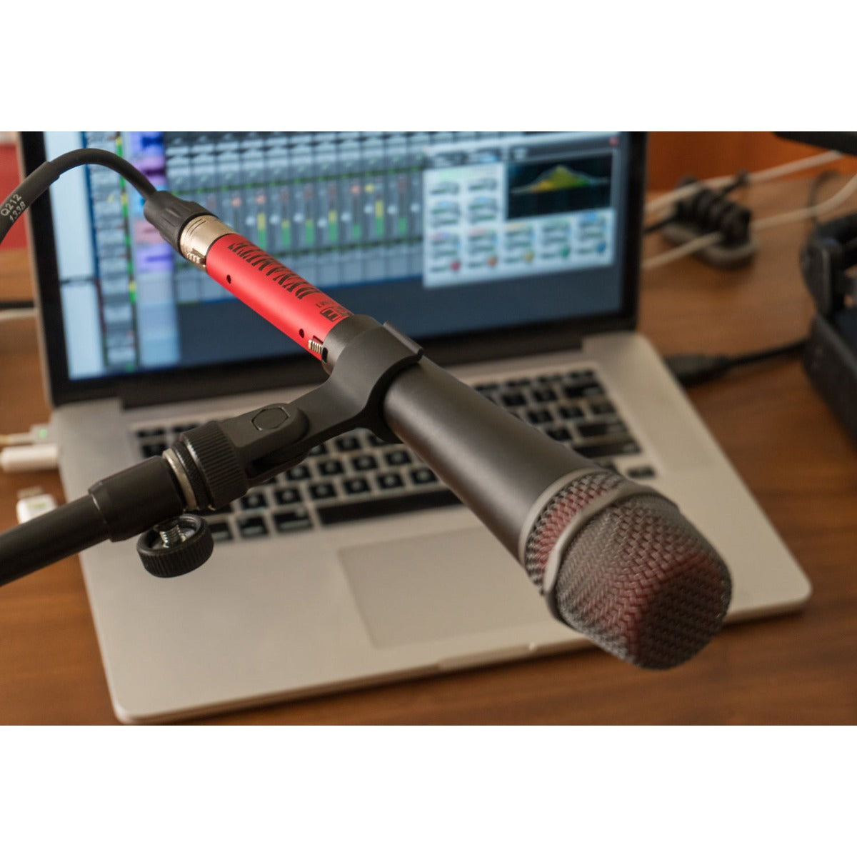 SE Electronics DM1 Dynamite microphone preamp in black, showing control knobs and input connections on a professional audio device.