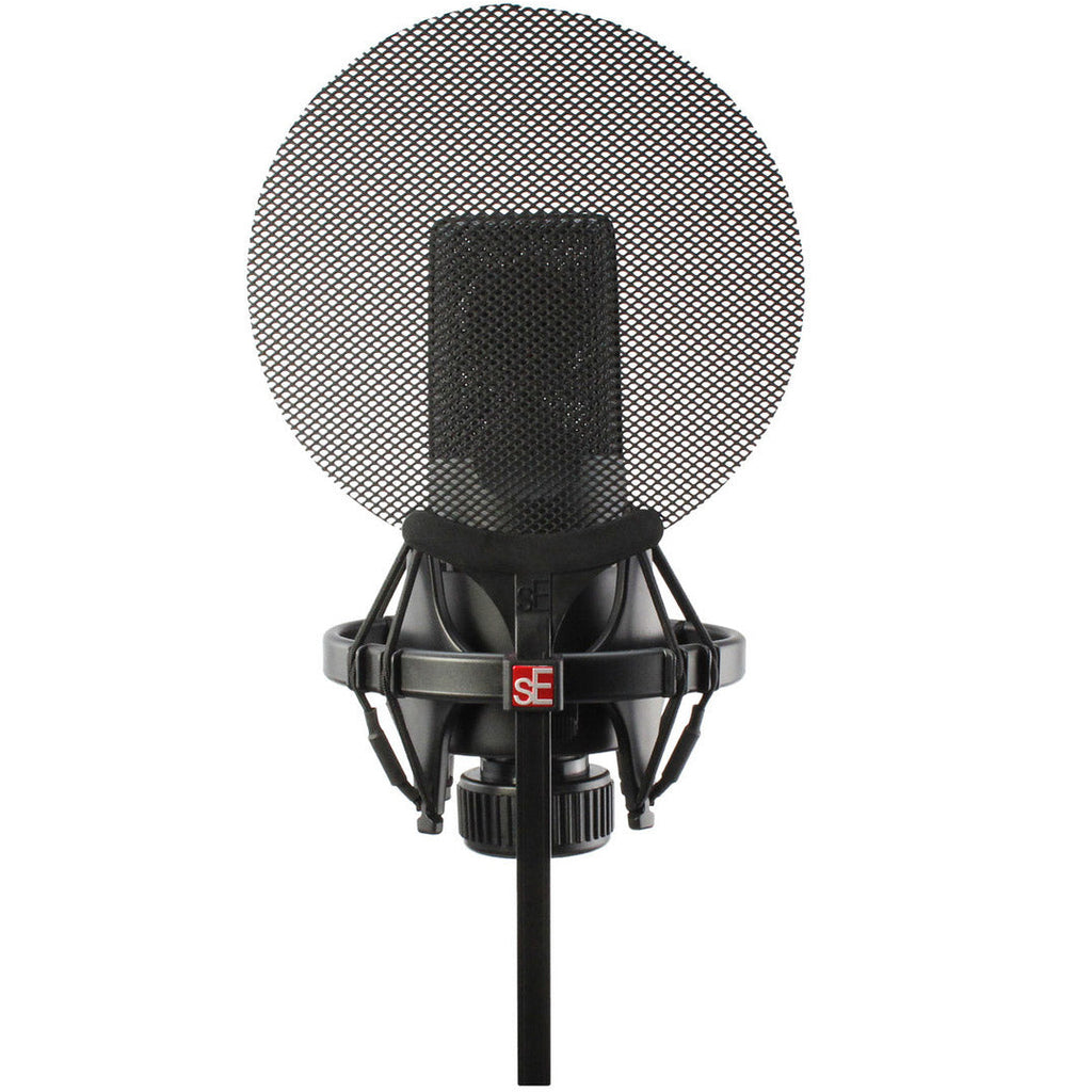 SE Electronics Isolation Pack with microphone shock mounts and adapters for professional audio recording setup.