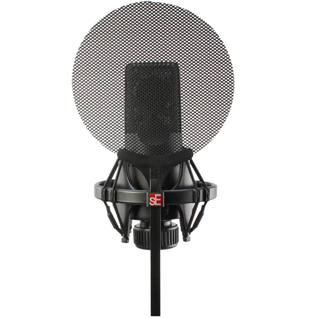 SE Electronics Isolation Pack with microphone shock mounts and adapters for professional audio recording setup.