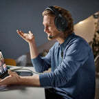 Man on a call wearing Sennheiser headphones with the HD 500 BAM boom mic