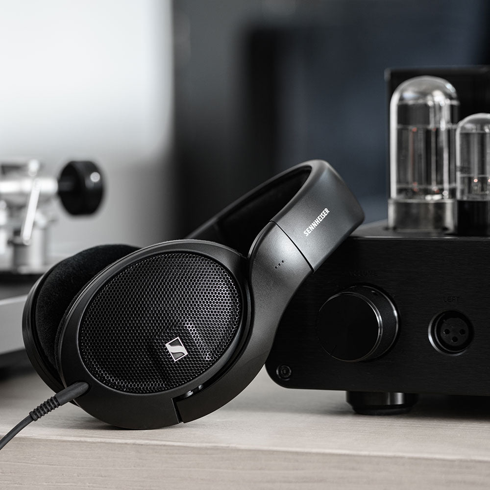 Sennheiser HD 560S headphones with amplifier, over-ear open-back design for detailed audio listening and high-fidelity sound.