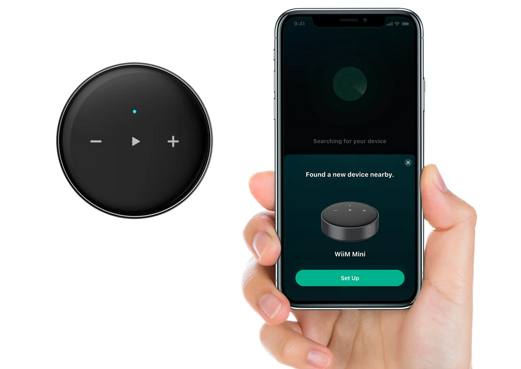 WiiM Mini music streamer setup with two devices connected, showing the compact design and user interface on the screen.