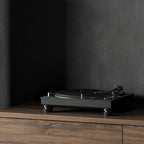 Technics SL-1210GR2 turntable with black plinth, silver tonearm, and control knobs, showcasing high-quality audio equipment.