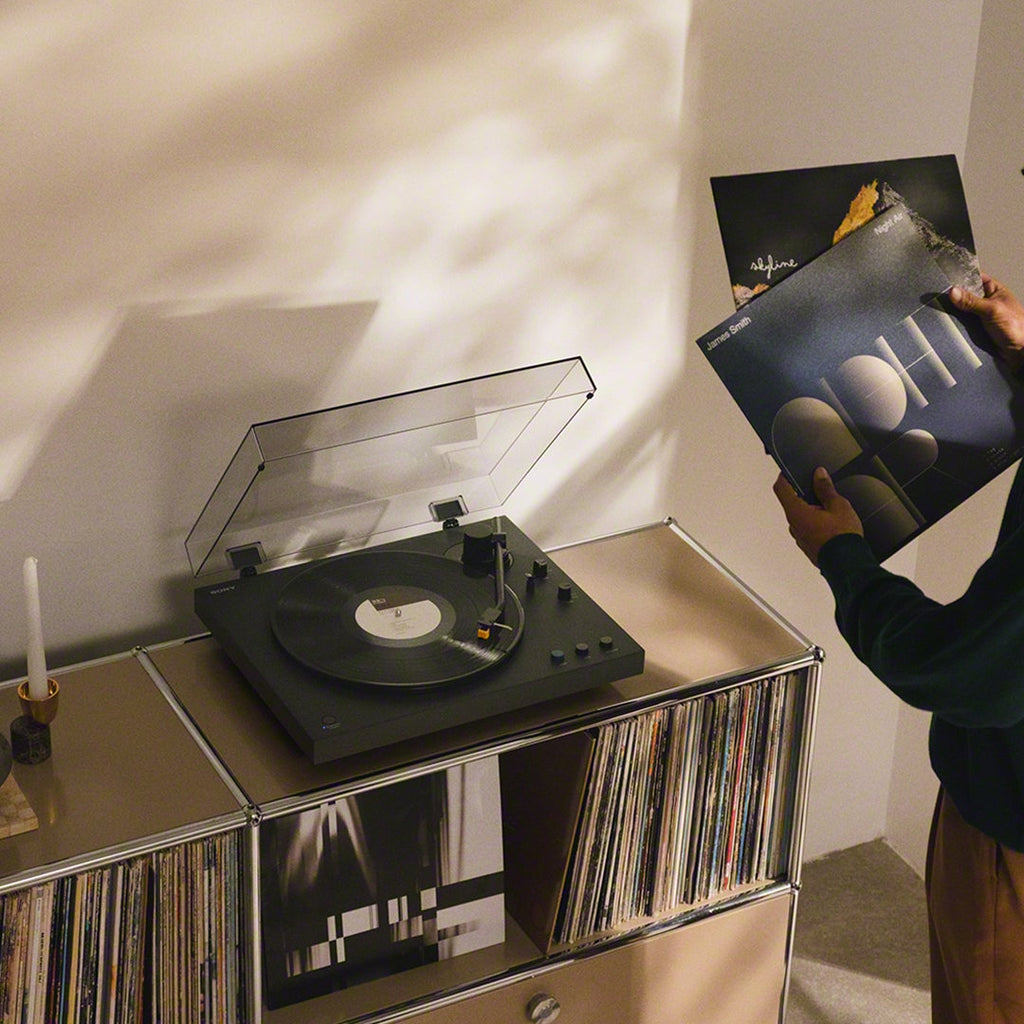 Sony PS-LX5BT turntable with a sleek design and built-in Bluetooth, featuring a tonearm and platter for vinyl playback.