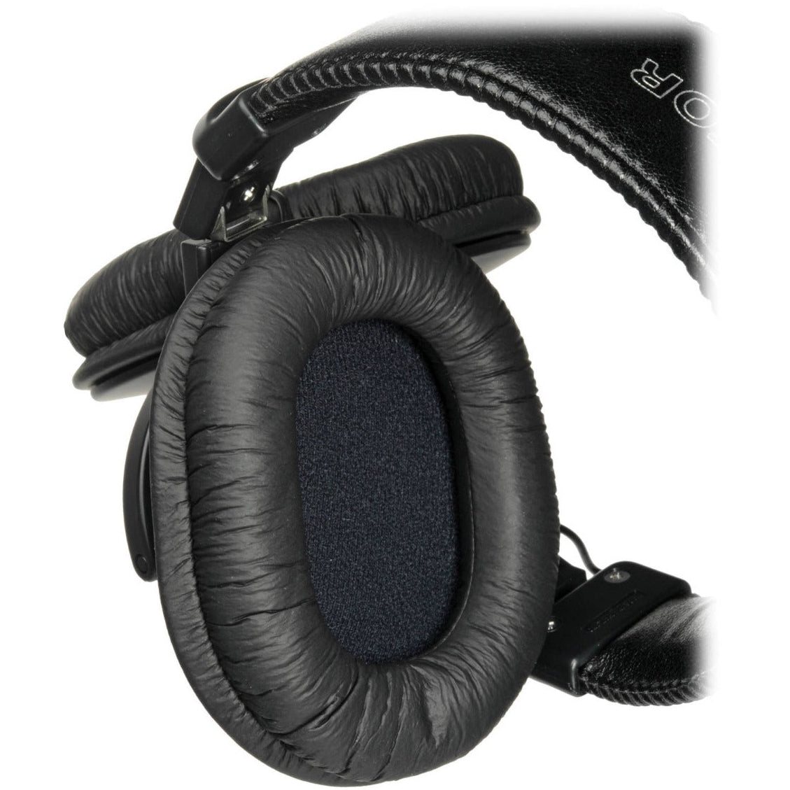 Sony MDR-7506 studio headphones with closed-back design, featuring large over-ear ear cups and adjustable headband for professional audio.