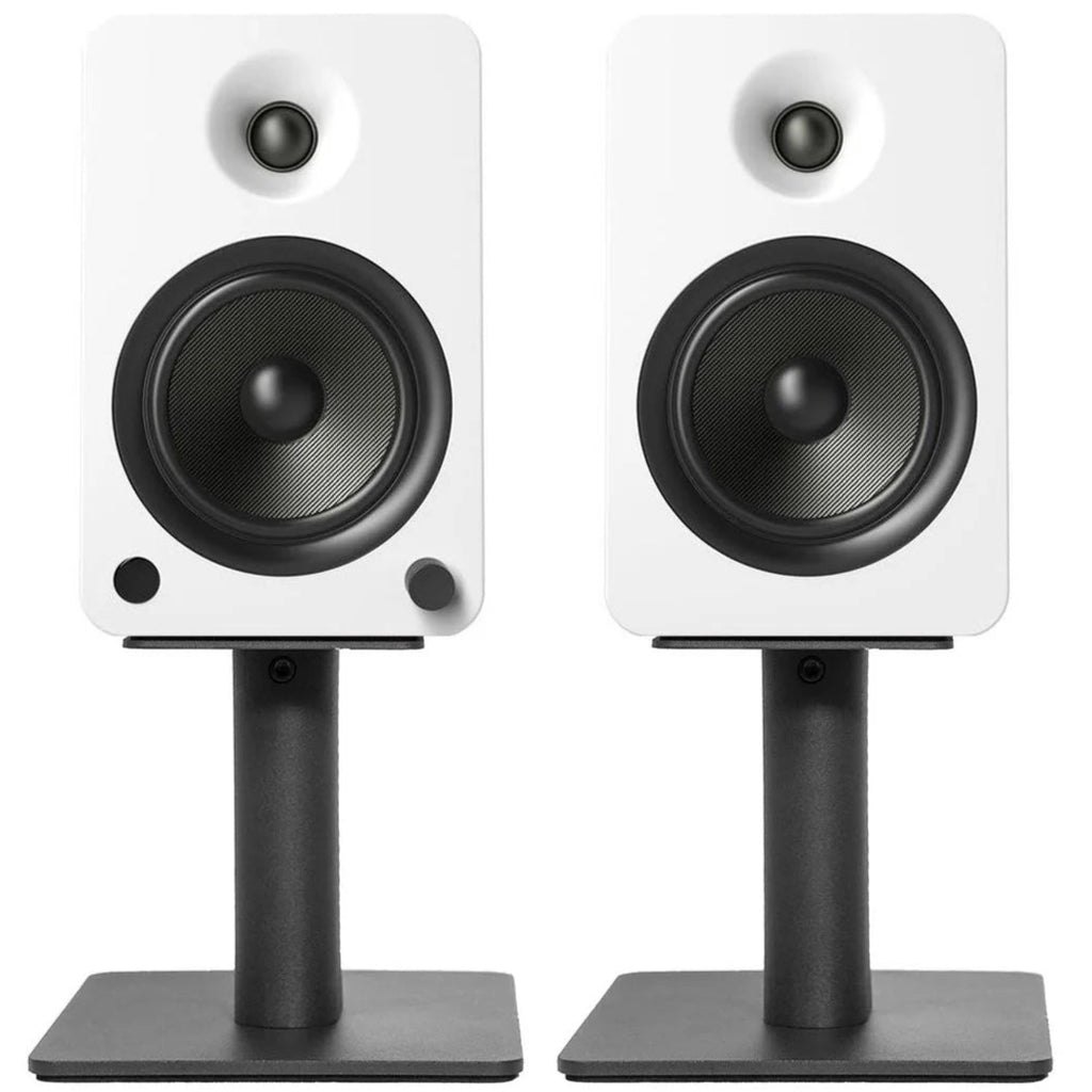 Kanto Audio SP6HD 6-inch desktop speaker stands supporting audio equipment on a clean surface, designed for optimal sound placement.
