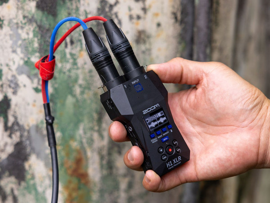 Zoom H1 XLR digital recorder with stereo and mono recording options, featuring compact design and professional audio quality.