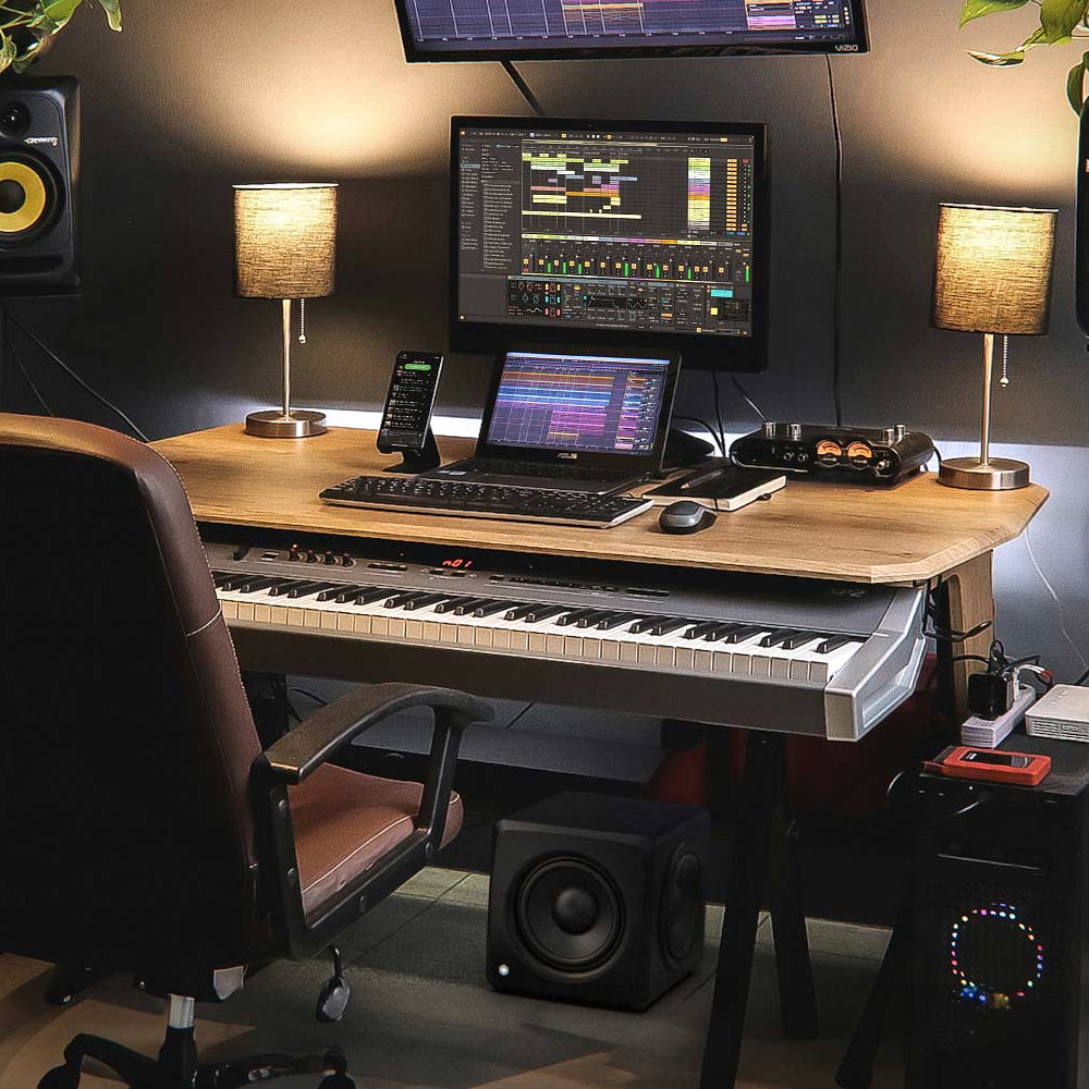 IK Multimedia iLoud Subwoofer showing its sleek black design and control panel, ideal for enhancing studio monitor bass response.