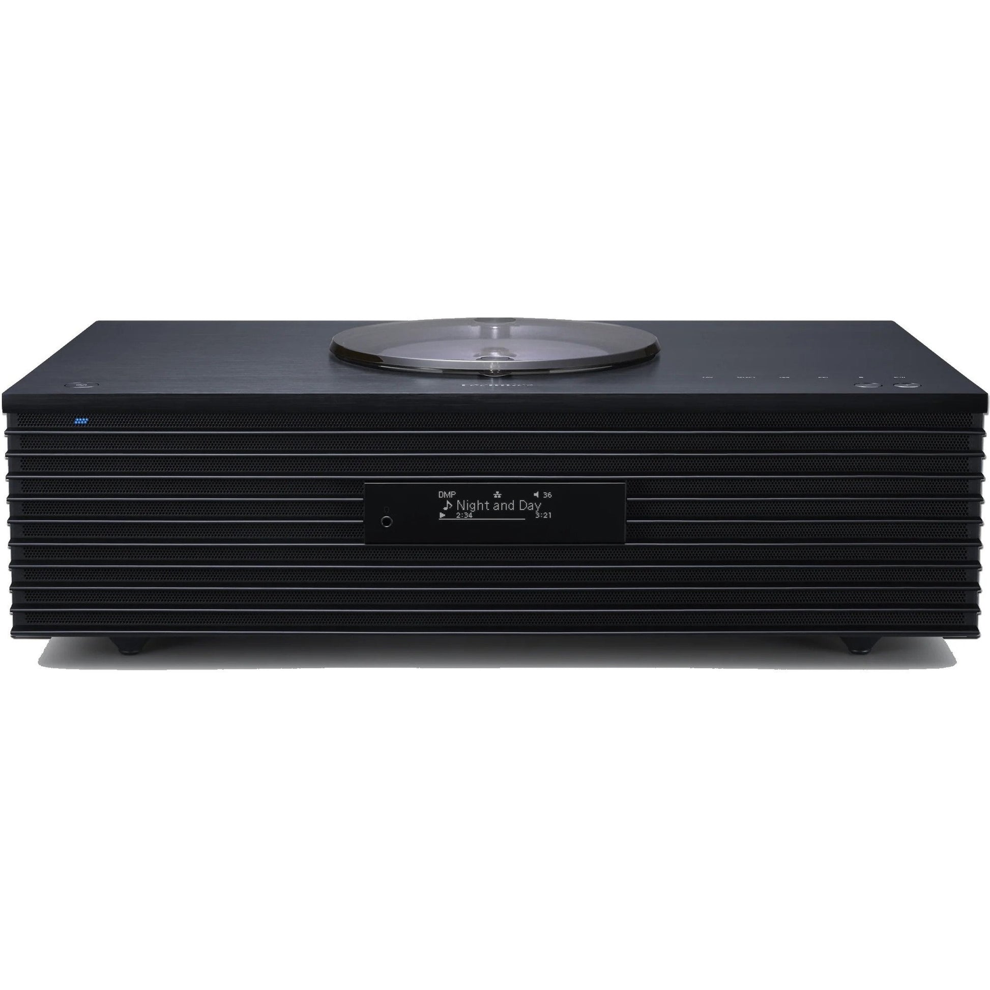 Technics SC-C70MK2 CD player with sleek design, digital display, and control buttons on top, in a modern home audio setup.