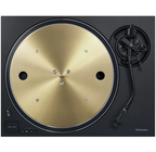 Black Technics SL-1300G turntable with direct-drive motor, featuring a sleek design and tonearm for high-quality vinyl playback.