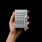 Teenage Engineering TX-6 portable mixer, compact size in hand