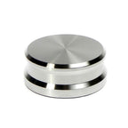 Silver Tonar record weight stabilizer with 45 adapter, designed to improve vinyl record playback stability.