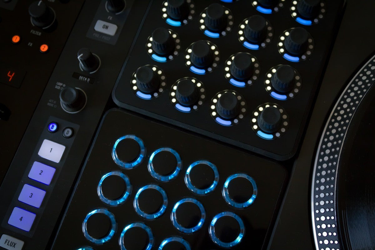 DJ TechTools MIDI Fighter Twister MIDI controller with colorful rotary knobs and buttons for music production and DJing.