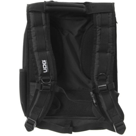 UDG DIGI BackPack in black and orange, designed for DJs, featuring spacious compartments and ergonomic straps.