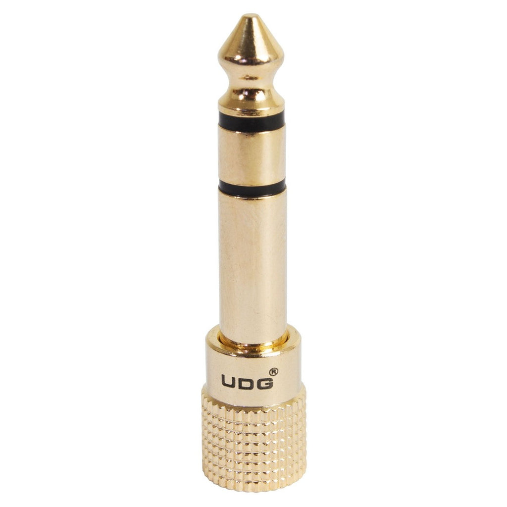 UDG Ultimate Headphone Jack Adapter Plug U94002 connected to audio device showing compact, gold-plated 3.5mm stereo headphone splitter