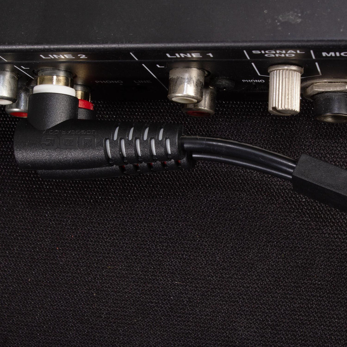 UDG Ultimate Audio RCA cable set with straight and angled connectors in black, 3-meter length, for high-quality audio connections.