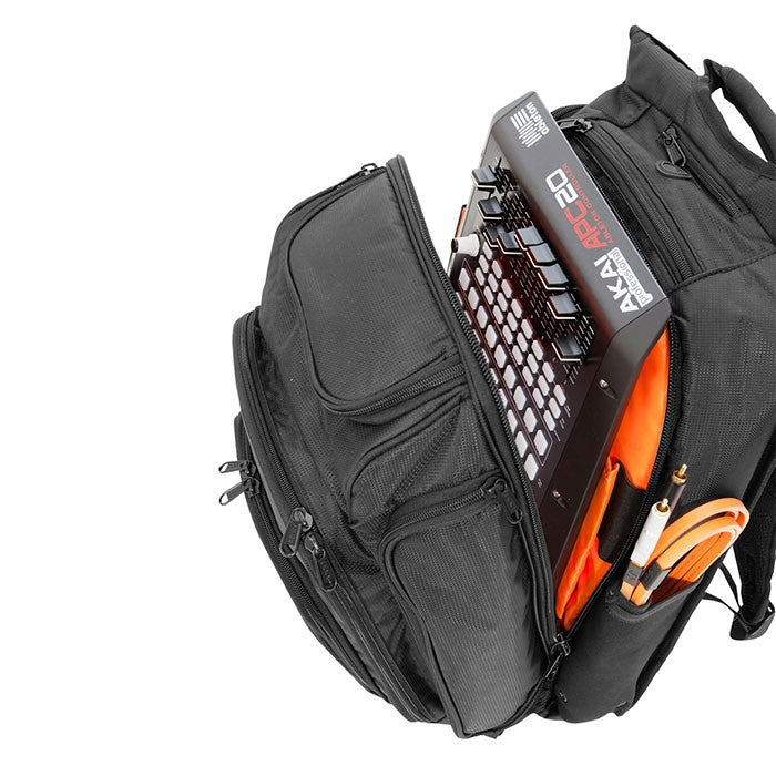 UDG DIGI Backpack in black and orange, featuring multiple compartments for DJ equipment and accessories.