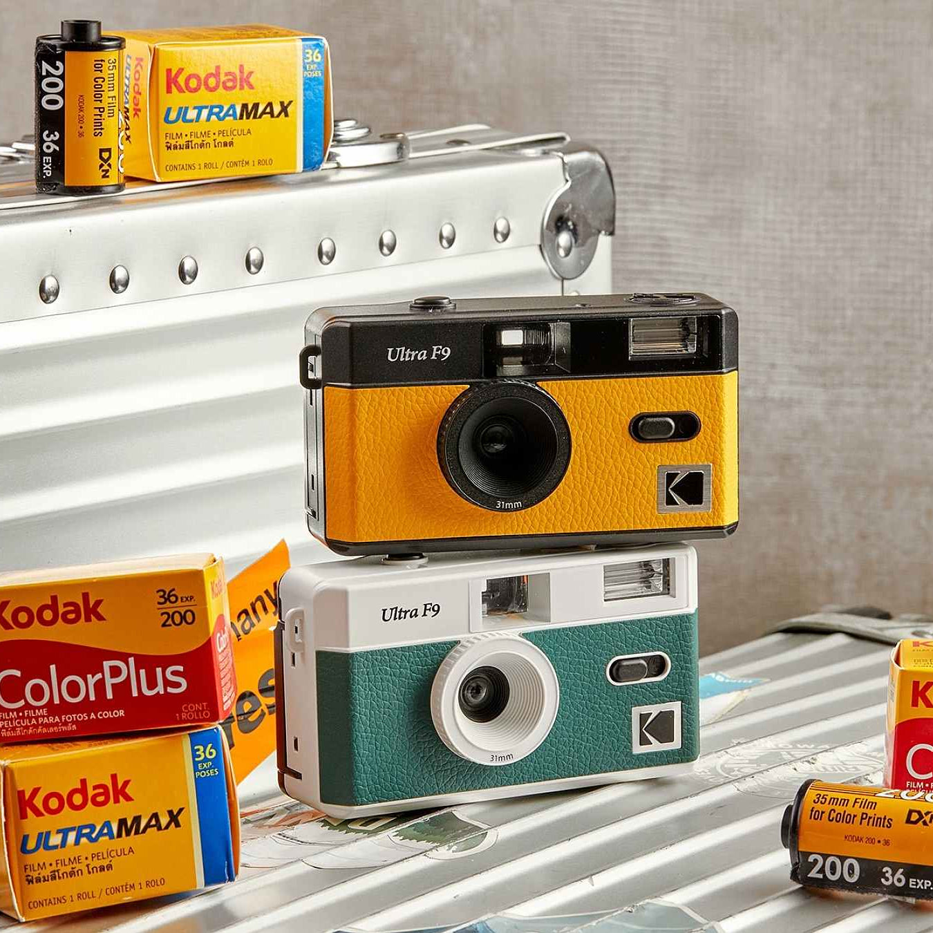 Two Kodak Ultra F9 reusable compact instant cameras in packaging, ready for capturing moments with classic film style.