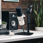 Universal Audio SD-1 dynamic microphone shown with black grille and metal body, ideal for vocals and instrument recording.