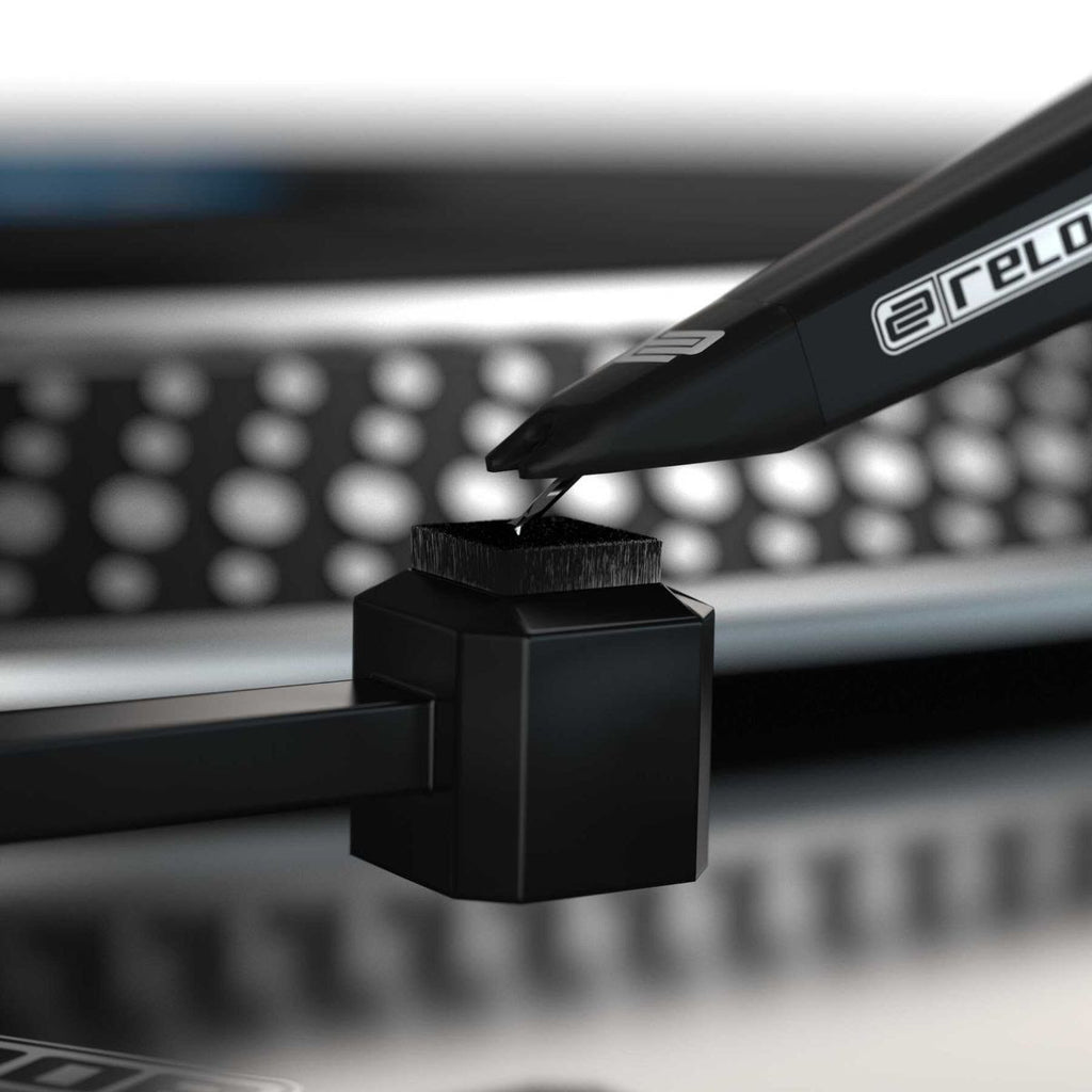 Reloop Premium Vinyl and Stylus Cleaning Set with record brushes and cleaning tools for maintaining audio records.