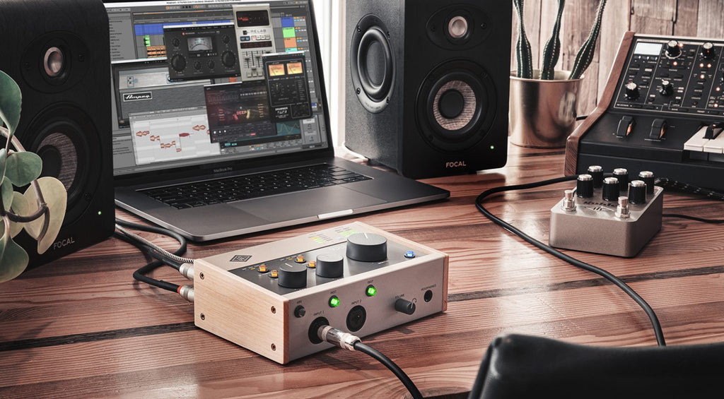 Universal Audio Volt 276 audio interface with multiple input and output ports, compact design, and professional-grade controls.