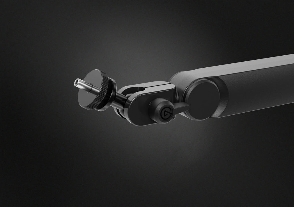 Close-up of Elgato Wave Mic Arm Pro, a sleek broadcast microphone arm with adjustable joints in a dark finish.