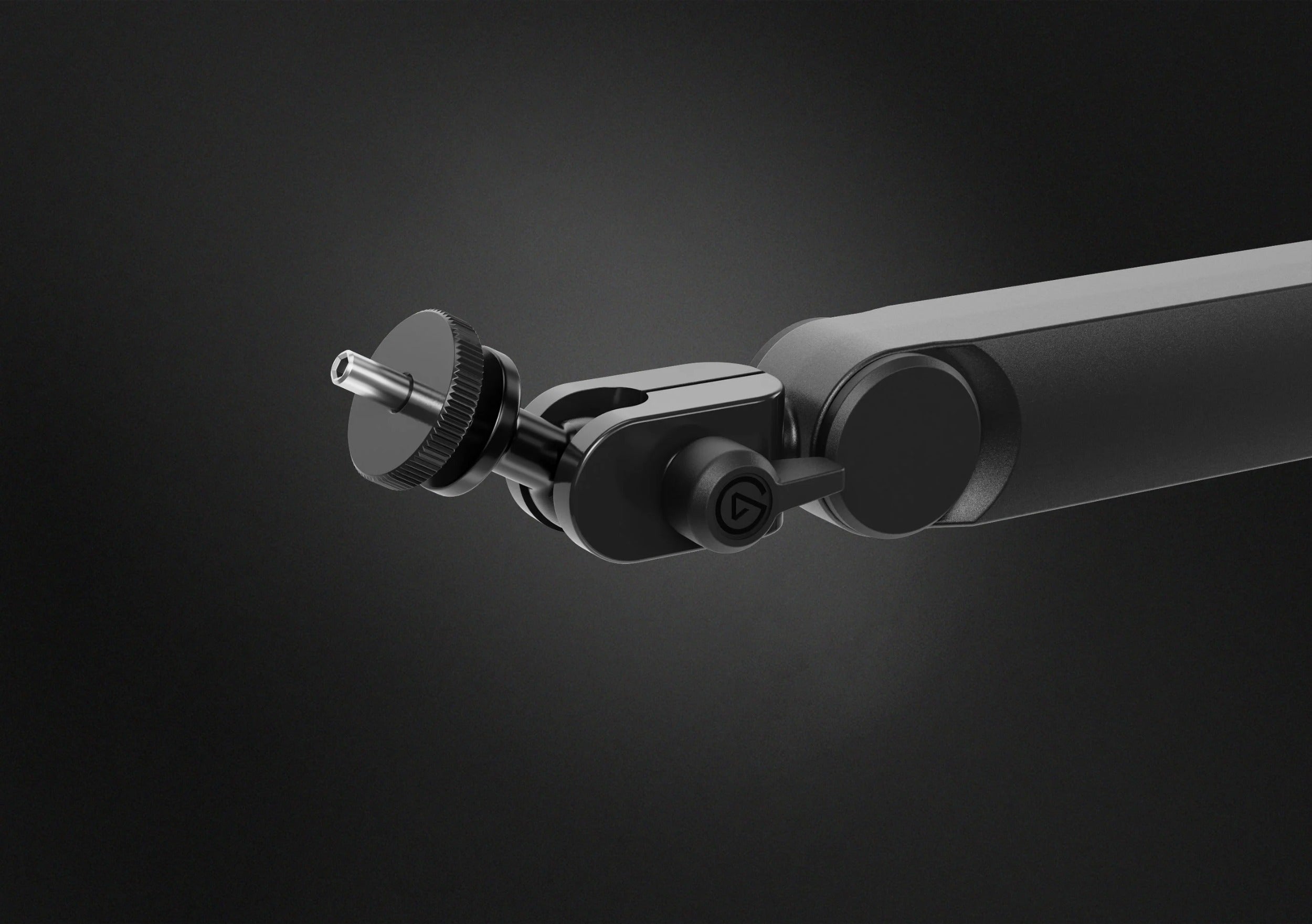 Close-up of Elgato Wave Mic Arm Pro, a sleek broadcast microphone arm with adjustable joints in a dark finish.