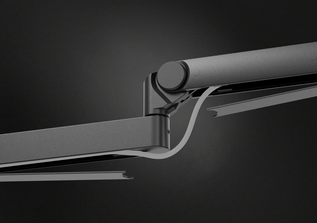 Close-up of Elgato Wave Mic Arm Pro, a dark broadcast microphone arm with adjustable joints and sleek design for streaming setups.