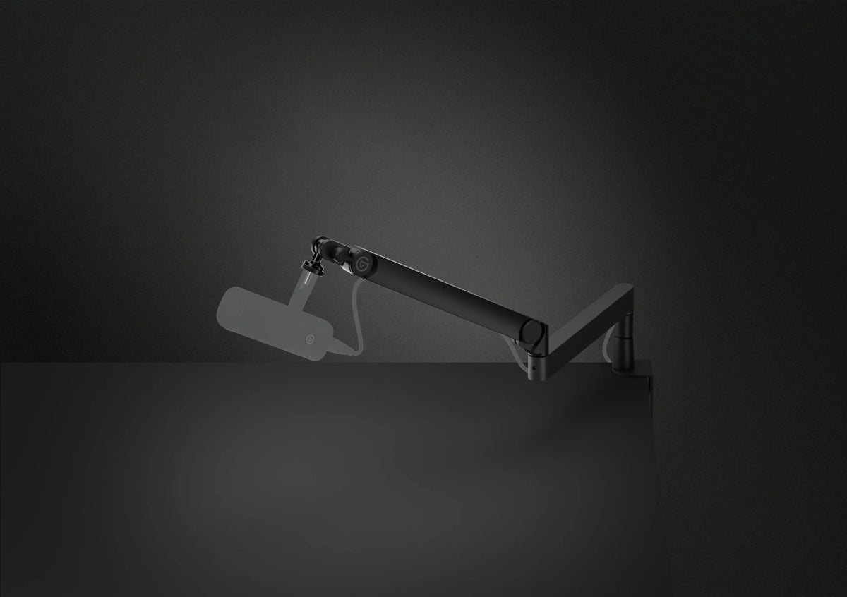 Elgato Wave Mic Arm Pro broadcast microphone arm attached to a desktop setup with adjustable arm and microphone mount.