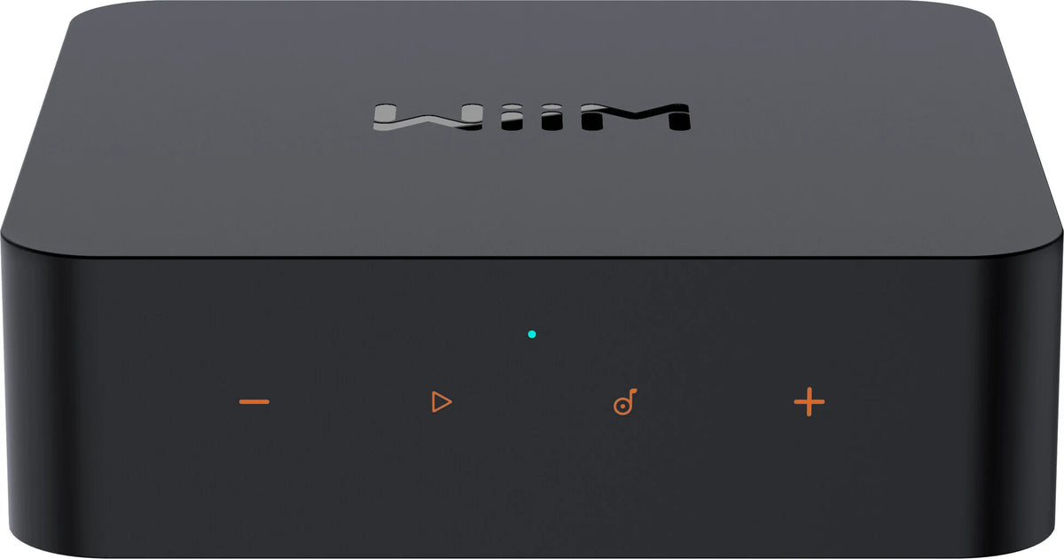 WiiM Pro Plus music streamer device with multiple ports and sleek black design, used for high-quality audio streaming.